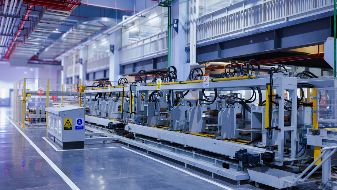Industrial automated conveyor line with machinery for E2E inductive and E3Z photoelectric sensors.